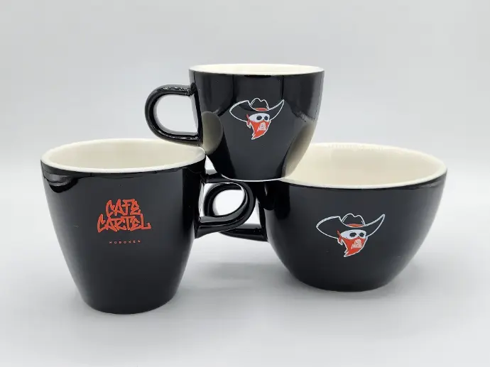 Versatile Pad Printing for Promotional Products Pad printing equipment transferring logo onto a curved surface