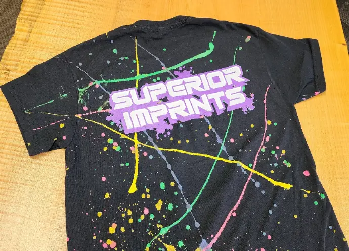 High-Quality Screen Printing for Promotional Items Screen printing process applying vibrant ink to t-shirts